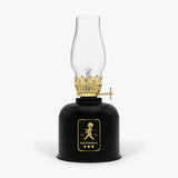 Fotogenlampa – Svart / Guld