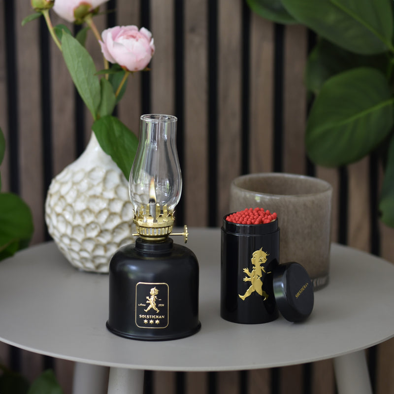 Fotogenlampa – Svart / Guld