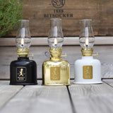 Fotogenlampa – Svart / Guld